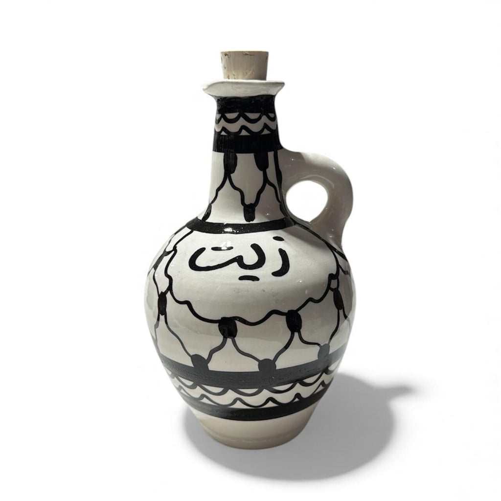Handmade ceramic Kufiyeh design ‘zeit’dispenser  tall approximately (9”) made in Palestine