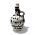 Handmade ceramic Kufiyeh design ‘zeit’dispenser  tall approximately (9”) made in Palestine