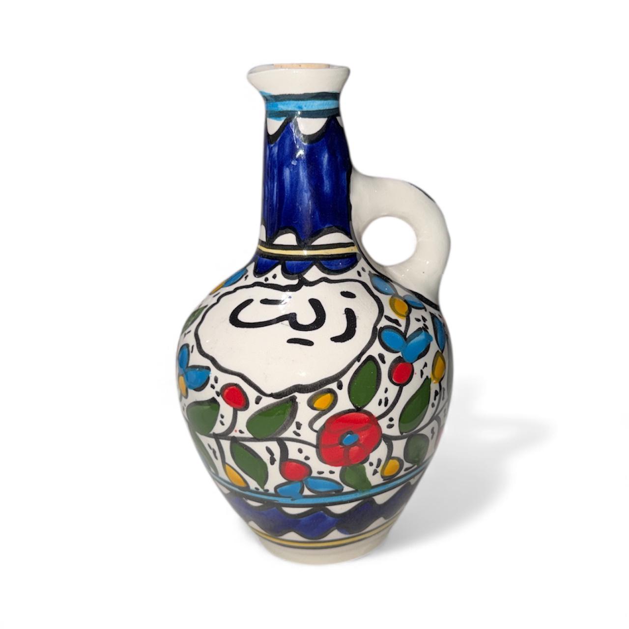 Handmade ceramic Floral design ‘zeit’dispenser  tall approximately (9”) made in Palestine