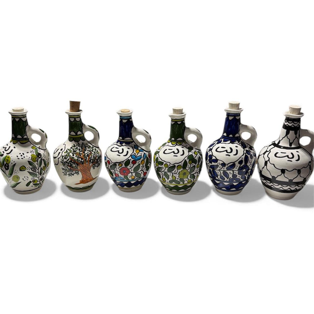 Handmade ceramic Green floral design ‘zeit’dispenser  tall approximately (9”) made in Palestine